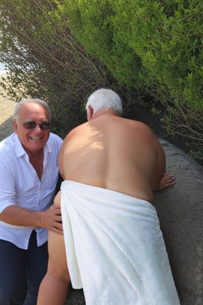 Old man anal sex on a public beach